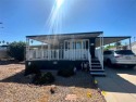 Discover refined living in this completely renovated 2-bedroom for sale in Needles California San Bernardino County County on GolfHomes.com