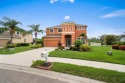 Stunning Lakefront Pool Home with Golf Course Views on the best for sale in Palmetto Florida Manatee County County on GolfHomes.com