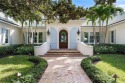 Perfectly situated and nestled in privacy landscaping, exquisite for sale in Vero Beach Florida Indian River County County on GolfHomes.com