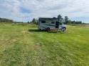 Discover the perfect getaway spot with this level, open lot for sale in Gladwin Michigan Gladwin County County on GolfHomes.com