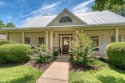 Welcome to this charming and thoughtfully designed Southern for sale in Meadowlakes Texas Burnet County County on GolfHomes.com