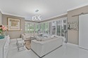 Modern and sophisticated, this first floor condo is completely for sale in Boca Raton Florida Palm Beach County County on GolfHomes.com