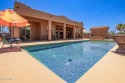 Discover the epitome of elegance in this custom home with a for sale in Arizona City Arizona Pinal County County on GolfHomes.com
