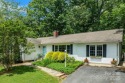 Discover this charming Black Mountain cottage, ideally situated for sale in Black Mountain North Carolina Buncombe County County on GolfHomes.com