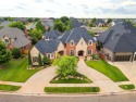 Large executive home in Rose Creek situated on a large lot with for sale in Edmond Oklahoma Oklahoma County County on GolfHomes.com