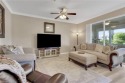 Bundled golf with WATER and GOLF COURSE VIEWS plus updated for sale in Estero Florida Lee County County on GolfHomes.com