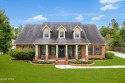 Welcome to this custom-built 5 bedroom, 3 bathroom for sale in Lynn Haven Florida Bay County County on GolfHomes.com