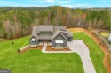 Experience casual living at its finest in this stunning open for sale in Newnan Georgia Coweta County County on GolfHomes.com