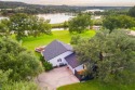 VIBRANT INKS LAKE COTTAGE -- Set on 1.2+ acres across two for sale in Burnet Texas Burnet County County on GolfHomes.com