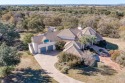 Move right in! This 4 BR 4 bath home is sold fully furnished! for sale in Horseshoe Bay Texas Llano County County on GolfHomes.com
