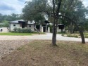 Estate living in the prestigious gated Horseshoe Bay equestrian for sale in Horseshoe Bay Texas Llano County County on GolfHomes.com