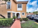 Natural light fills this inviting 3-bedroom, 2.5-bath corner for sale in Miami Florida Miami-Dade County County on GolfHomes.com