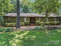 Welcome to this 1970s ranch-style home located in the desirable for sale in Charlotte North Carolina Mecklenburg County County on GolfHomes.com