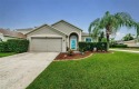 Welcome to this stunning 4-bedroom, 3-bathroom pool home located for sale in Trinity Florida Pasco County County on GolfHomes.com