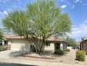 Discover this charming 2-bedroom, 2-bath, plus den, nestled in for sale in Buckeye Arizona Maricopa County County on GolfHomes.com
