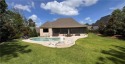 Enjoy the tranquility of this private oasis situated on almost 1 for sale in Auburn Alabama Lee County County on GolfHomes.com