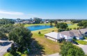 Deer Island, nestled between the serene Lake Dora and Lake for sale in Tavares Florida Lake County County on GolfHomes.com