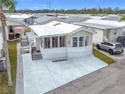 CHARMING MOBILE HOME IN ACTIVE 55+ COMMUNITY! Pride of ownership for sale in Bradenton Florida Manatee County County on GolfHomes.com