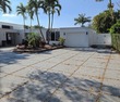 Experience this beautifully updated 5-bedroom, 3.5-bath pool for sale in Plantation Florida Broward County County on GolfHomes.com