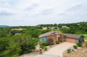 Nestled at the end of a very private cul-de-sac, built by for sale in Lago Vista Texas Travis County County on GolfHomes.com