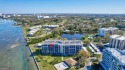 Stunning, sixth floor, waterfront condo with impact doors for sale in Belleair Beach Florida Pinellas County County on GolfHomes.com