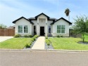 Welcome to this modern and cozy open-concept home, built in 2022 for sale in Pharr Texas Hidalgo County County on GolfHomes.com