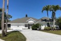 Lovingly updated 4/3/2 pool home in Meadow Wood. Very private for sale in Wellington Florida Palm Beach County County on GolfHomes.com