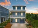 Stunning Coastal Retreat Steps from Golf & Beach in PCB!Welcome for sale in Panama City Florida Bay County County on GolfHomes.com