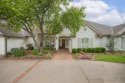 Welcome to this stunning single-story residence where modern for sale in Edmond Oklahoma Oklahoma County County on GolfHomes.com