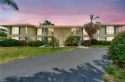 This amazing second floor end-unit is a show stopper! It for sale in Naples Florida Collier County County on GolfHomes.com