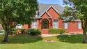 Overlooking the scenic fairways of Saugahatchee Golf Course for sale in Opelika Alabama Lee County County on GolfHomes.com