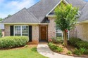 This thoughtfully designed 4-bedroom, 3-bathroom all-brick home for sale in Auburn Alabama Lee County County on GolfHomes.com