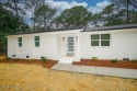 This beautifully renovated single-story home offers a modern for sale in Southport North Carolina Brunswick County County on GolfHomes.com