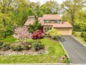 Beautiful well maintained contemporary colonial with mature for sale in Hauppauge New York Suffolk County County on GolfHomes.com