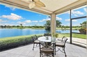Enjoy spectacular panoramic lake and golf course views from this for sale in Naples Florida Collier County County on GolfHomes.com