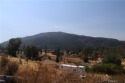 PANORAMIC MOUNTAIN AND VALLEY VIEWS are on offer from this large for sale in Cobb California Lake County County on GolfHomes.com