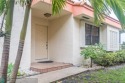 Immaculate lakefront townhome / villa in the prestigious Emerald for sale in Hollywood Florida Broward County County on GolfHomes.com