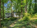 Nestled in the sought-after Gillette Woods neighborhood, this for sale in Tryon North Carolina Polk County County on GolfHomes.com