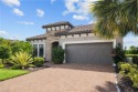 LIVE A VACATION LIFESTYLE IN ESPLANADE! FULL GOLF MEMBERSHIP for sale in Naples Florida Collier County County on GolfHomes.com