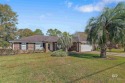 This 4-bedroom, 2-bathroom home in Foley, AL offers the perfect for sale in Foley Alabama Baldwin County County on GolfHomes.com