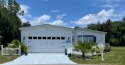 This home is located within a 55+ resort style leased land for sale in Lakeland Florida Polk County County on GolfHomes.com