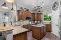 Custom home located in a gated and guarded community, with for sale in De Cordova Texas Hood County County on GolfHomes.com