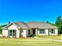 Gorgeous NEW HOME with FOUR bedrooms in desirable Magnolia Ridge for sale in Millbrook Alabama Elmore County County on GolfHomes.com