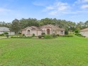 NEW PRICE AND A NEW ROOF! DO NOT delay visiting THIS GORGEOUS for sale in Lady Lake Florida Lake County County on GolfHomes.com