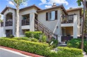 Welcome to this exquisite two-bedroom upstairs, end-unit in the for sale in Tustin California Orange County County on GolfHomes.com