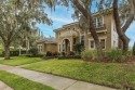 CHAMPIONS CLUB Luxury Bayfair Custom built home tucked behind for sale in Trinity Florida Pasco County County on GolfHomes.com