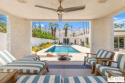 Opportunity is knocking at the iconic double doors of this 4 bed for sale in Palm Springs California Riverside County County on GolfHomes.com