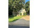 Nestled on a serene, wooded lot with immaculate landscaping and for sale in Auburn Alabama Lee County County on GolfHomes.com