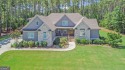 Located in the prestigious River Forest subdivision,   this 5 for sale in Forsyth Georgia Monroe County County on GolfHomes.com