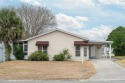 Welcome to this charming 2 bedroom 2 bathroom site built home for sale in Lady Lake Florida Lake County County on GolfHomes.com